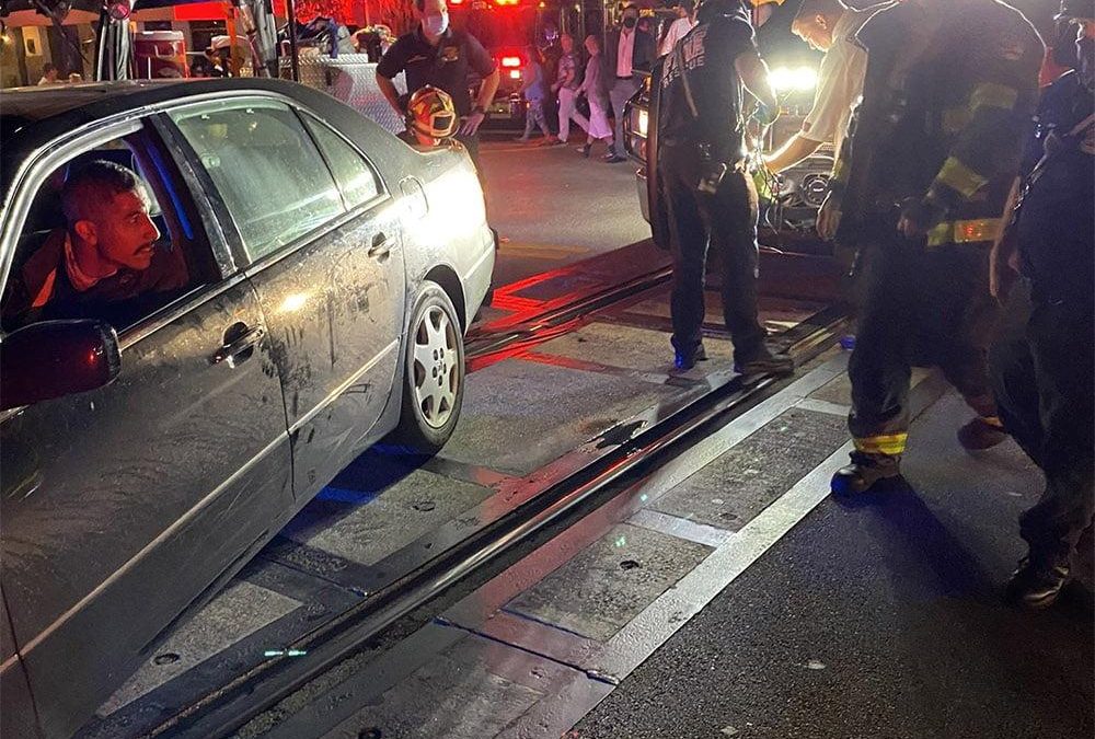 NEAR MISS: Delray Beach Fire Rescue Helps Driver Stuck On Railroad Tracks