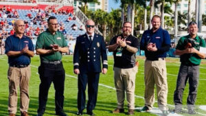 Retired Boca Raton Fire Captain Aaron Fix Honored At Boca Raton Bowl
