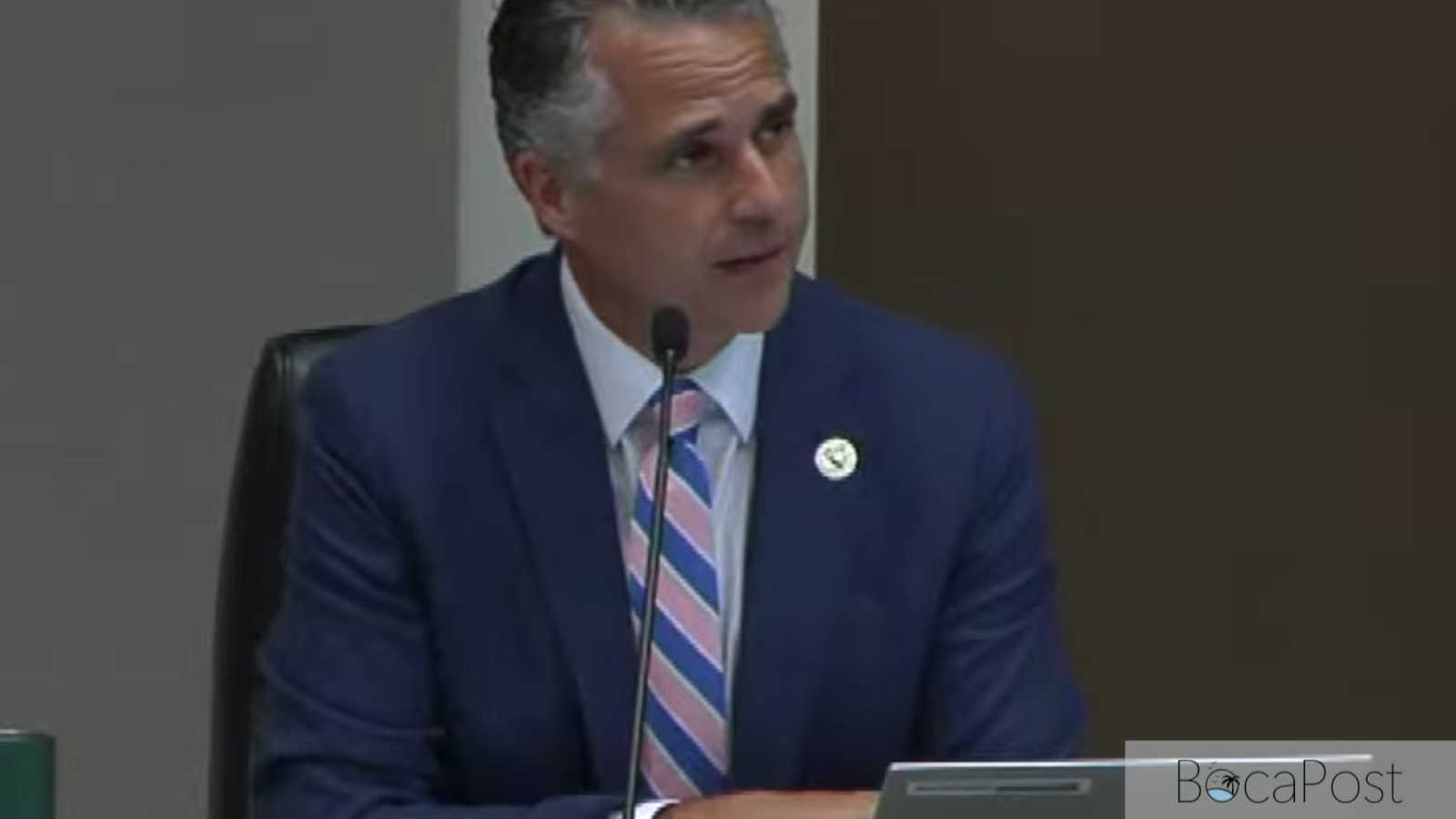 James Zervis presenting pension ordinance updates at a Boca Raton City Council meeting.