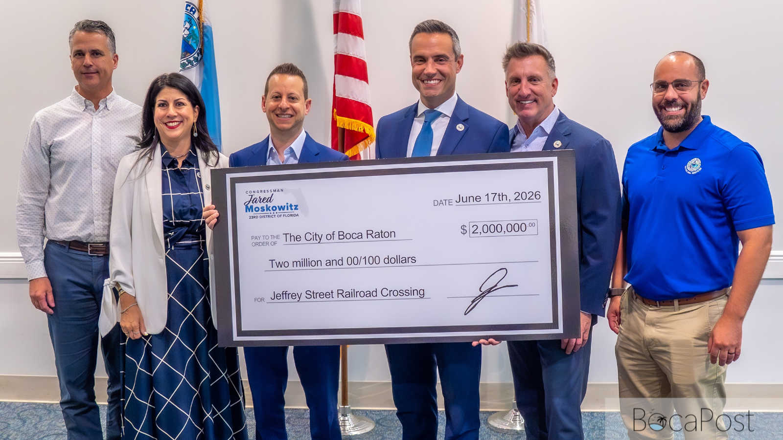 Congressman Jared Moskowitz and Boca Raton officials present ceremonial check for Jeffery Street railroad crossing funding.
