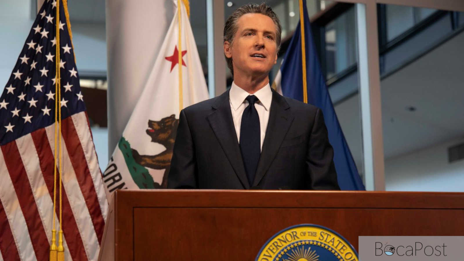 California Gov. Gavin Newsom speaking at a podium in 2020.