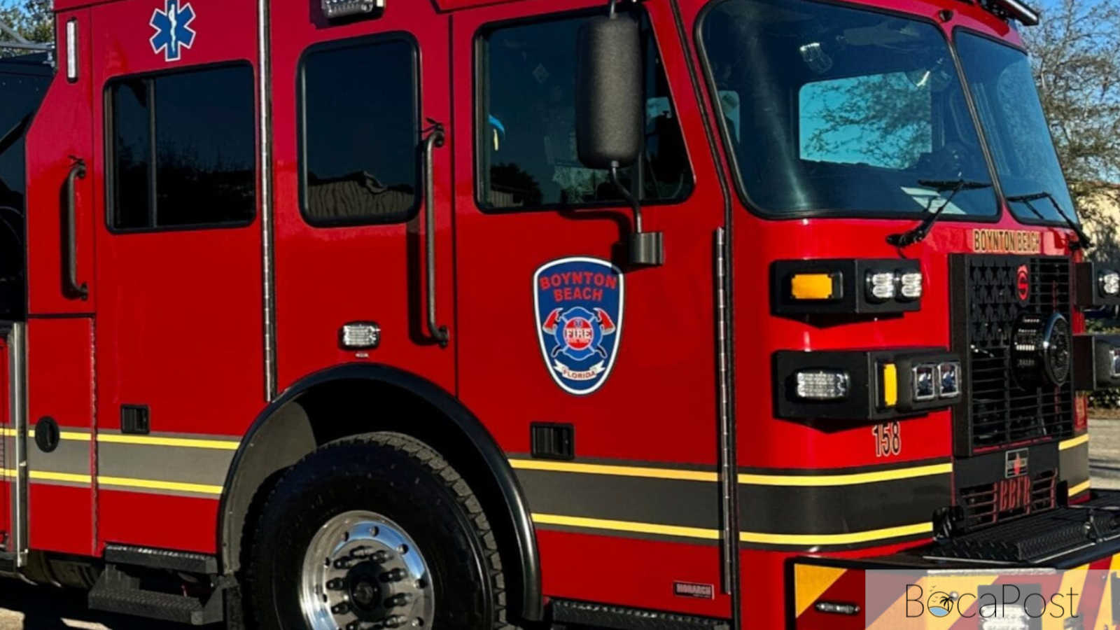 Boynton Beach Fire Rescue engine parked outside a fire station.