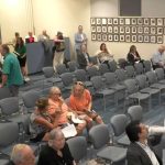 Boynton Beach City Hall Commission Chambers With Residents In Attendance During A Public Hearing.