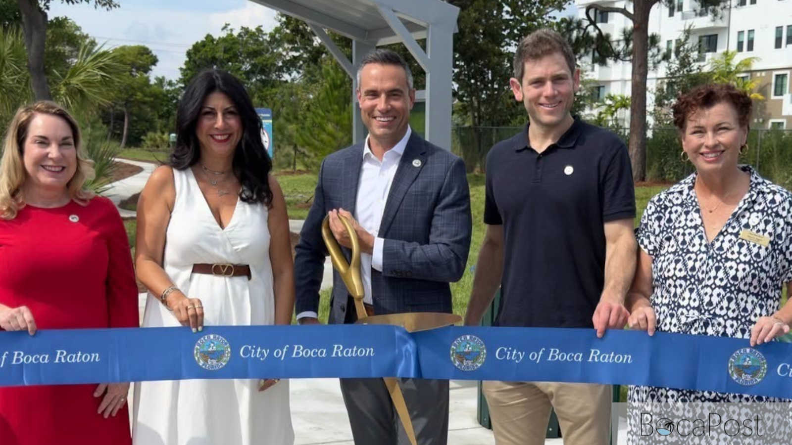 Boca Raton Mayor Andy Thomson and four City Council members cutting a ribbon at the Gopher Tortoise Preserve
