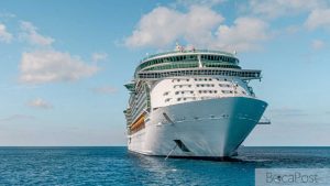 White And Blue Cruise Ship At Sea Under A Blue Sky, Used As An Illustrative Image For A Palm Beach County Court Filing.