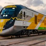 Brightline Train Passing Through A Boca Raton Railroad Crossing.